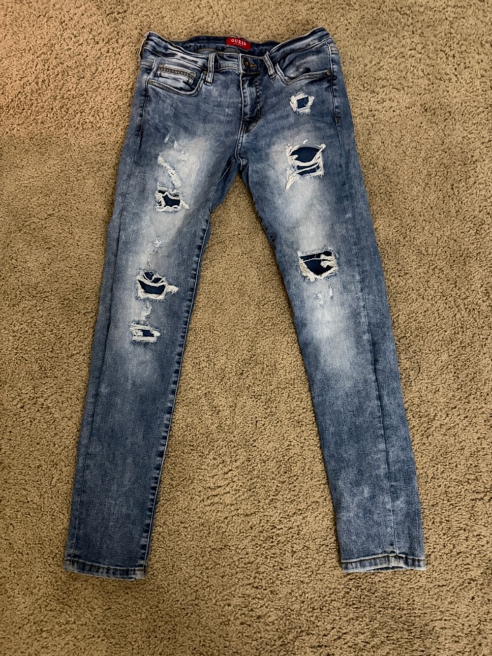 Guess Men’s Skinny Jeans in Distressed Light Blue Denim